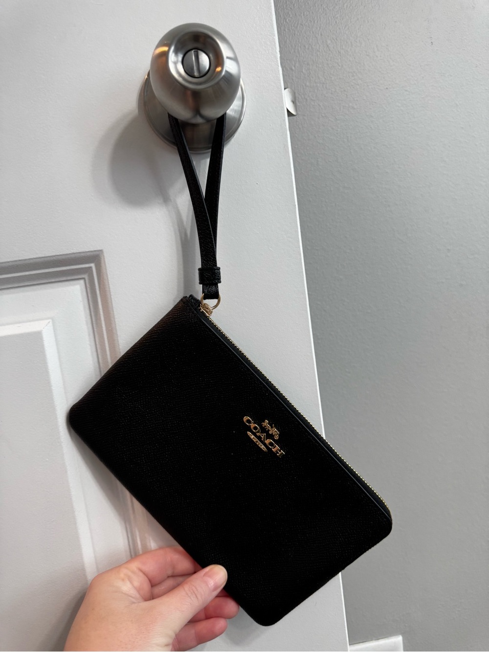 Coach Black Wristlet with Gold Logo Accent